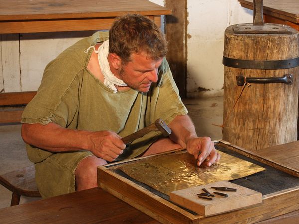 Römischer Handwerker bei der Arbeit
